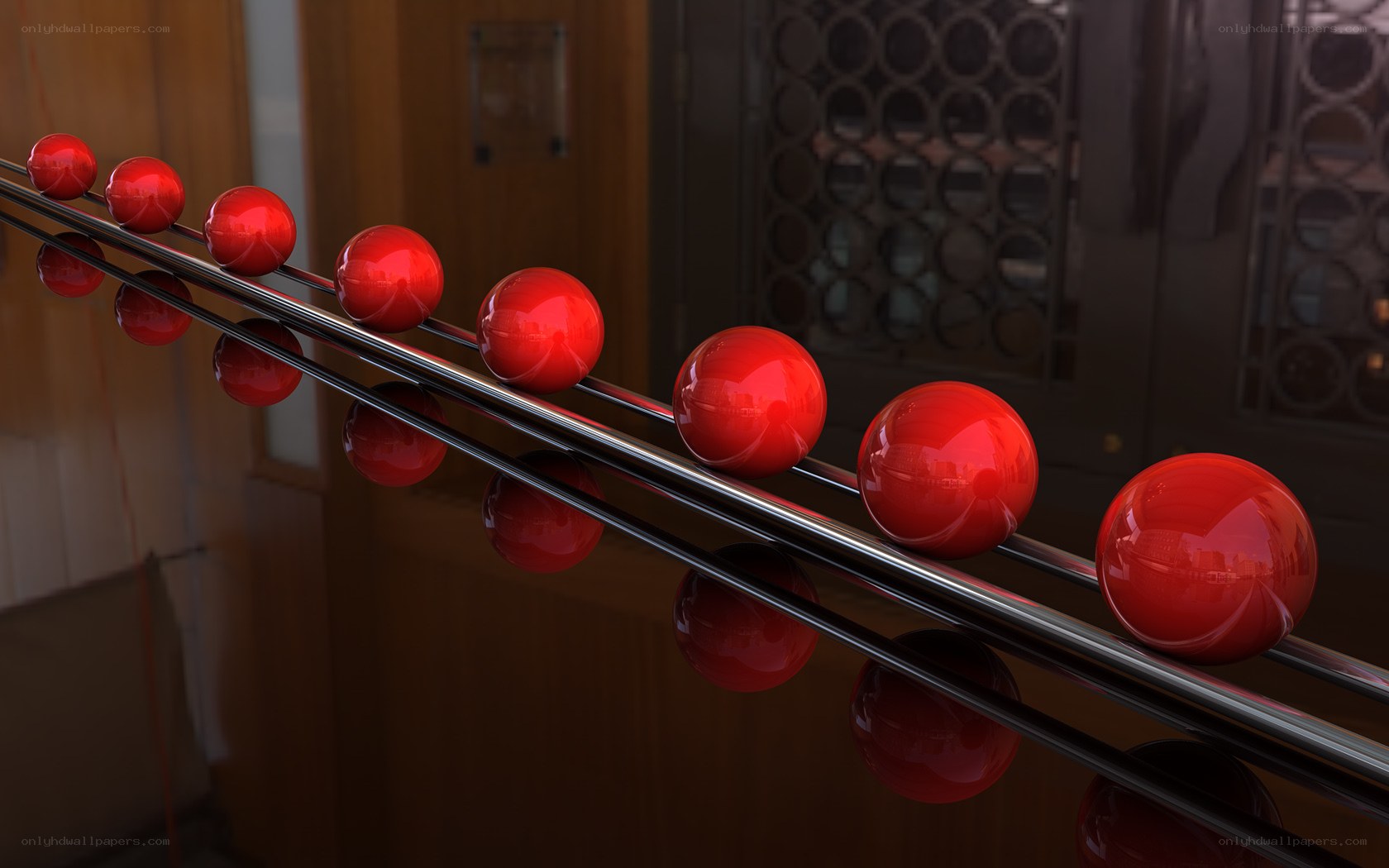 Red spheres on metal rails