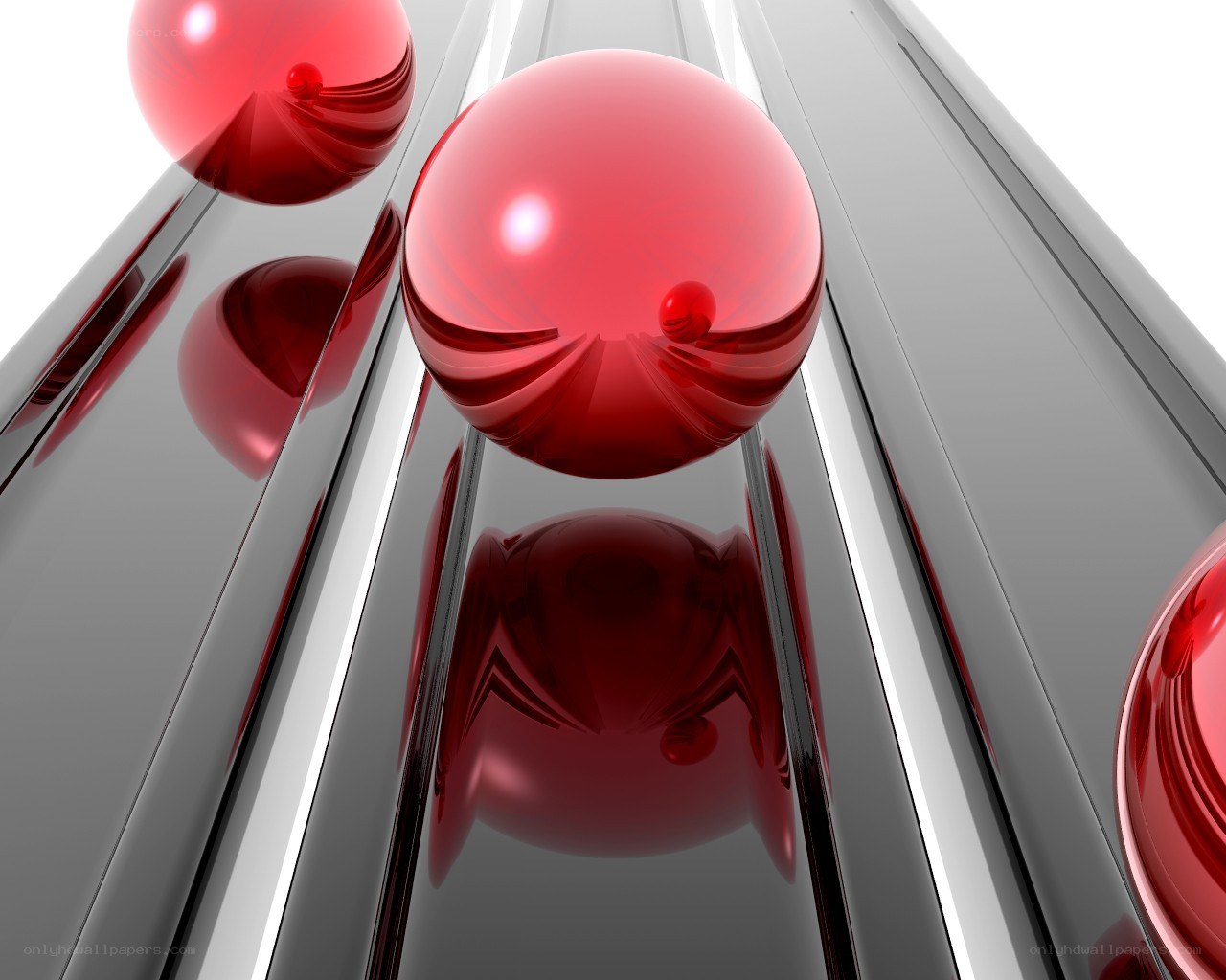 Red spheres on metallic tracks
