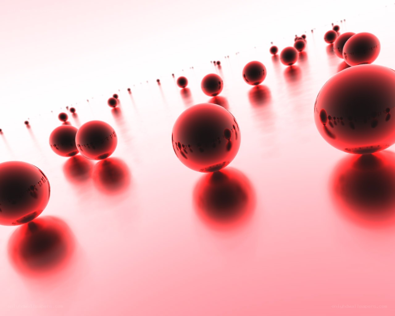 Red spheres on reflective surface