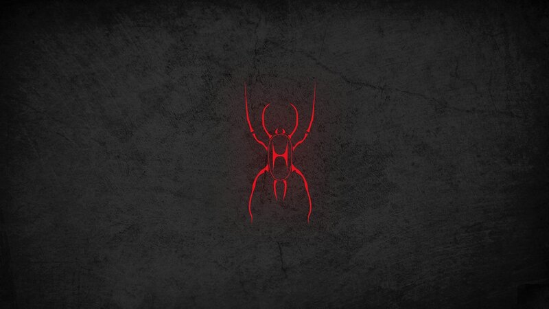 red spider logo on dark background