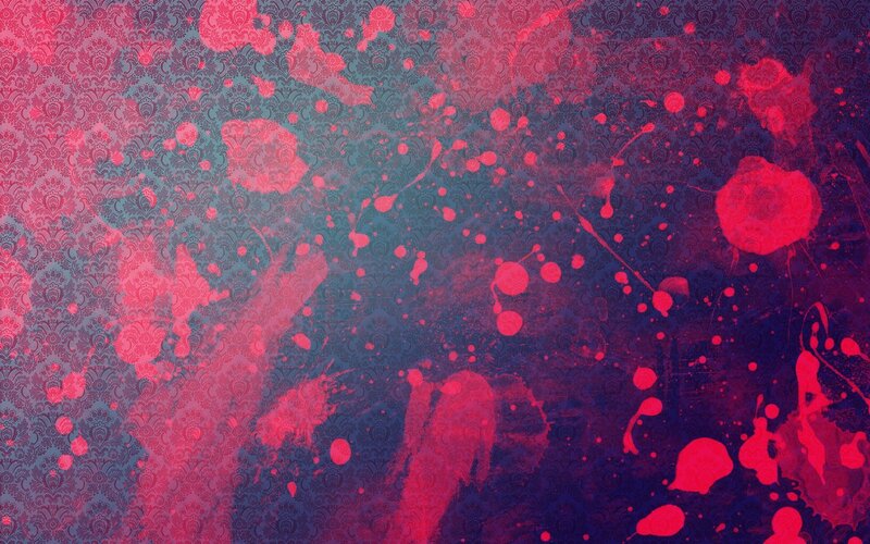 Red Splatters on Patterned Background