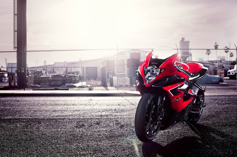 Red sport motorcycle in industrial lot