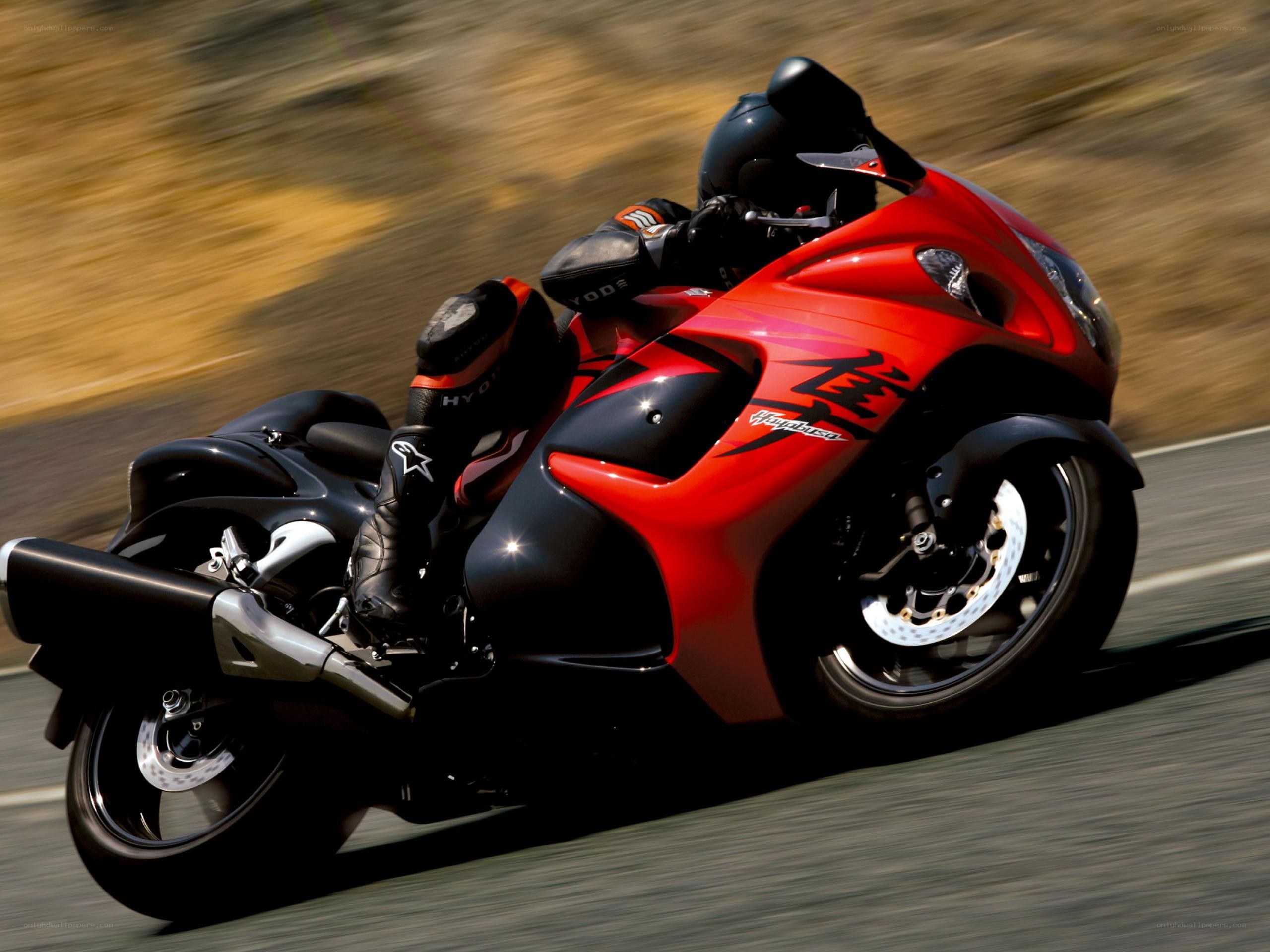 Red sport motorcycle in motion