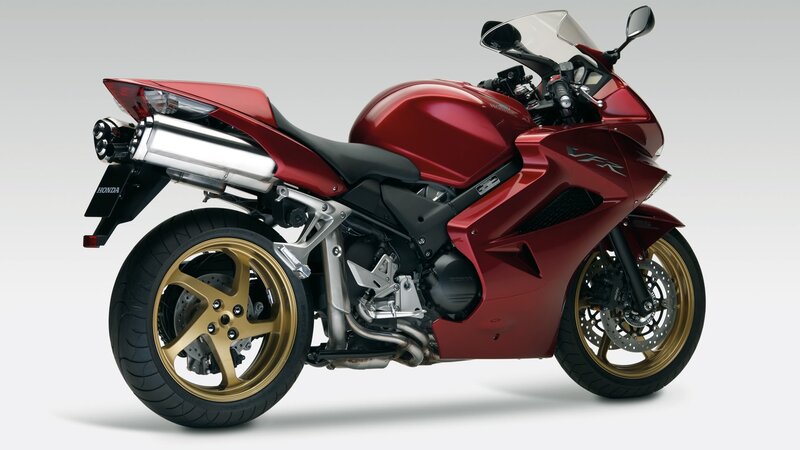 Red Sport Motorcycle — Neutral, Photograph, Gold Wheels, Exhaust Pipe