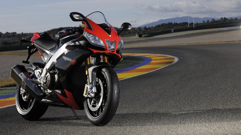 Red sport motorcycle on racetrack