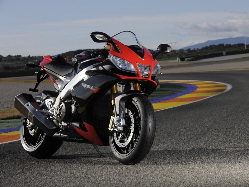 Red sport motorcycle on racetrack