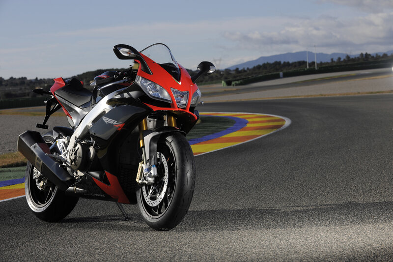Red sport motorcycle on racetrack