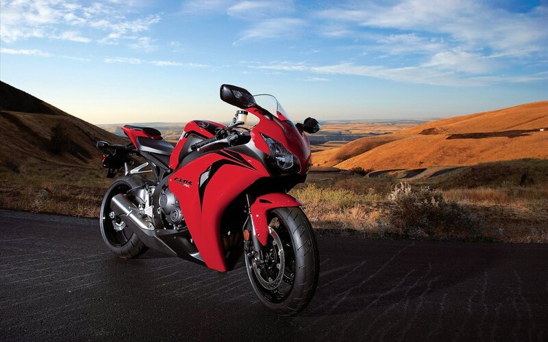 Red sport motorcycle on road