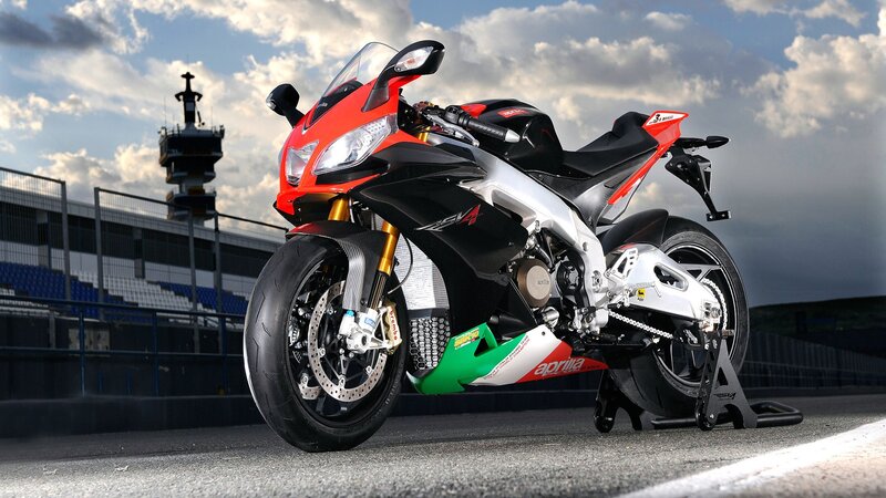 red sport motorcycle on track