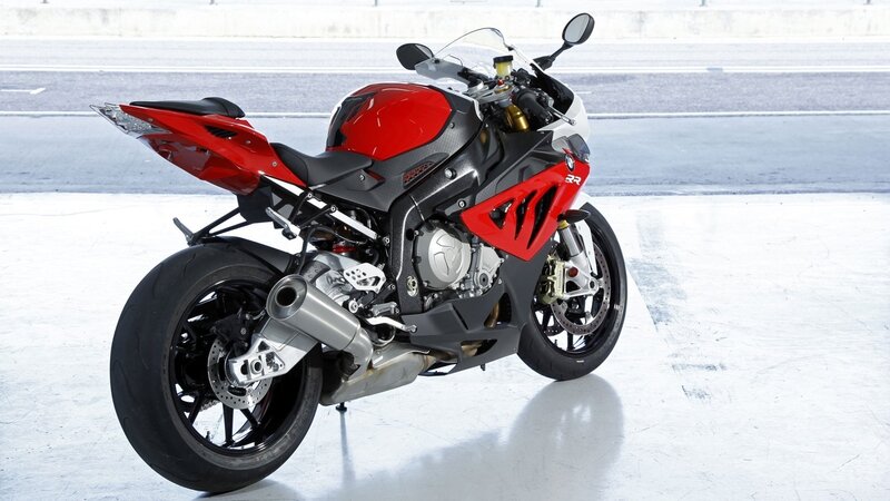 red sport motorcycle on track