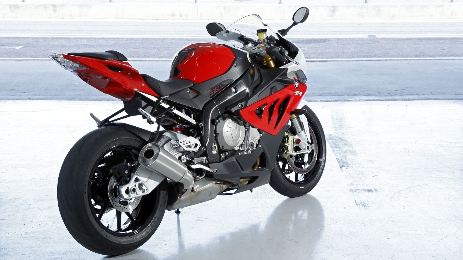 red sport motorcycle on track