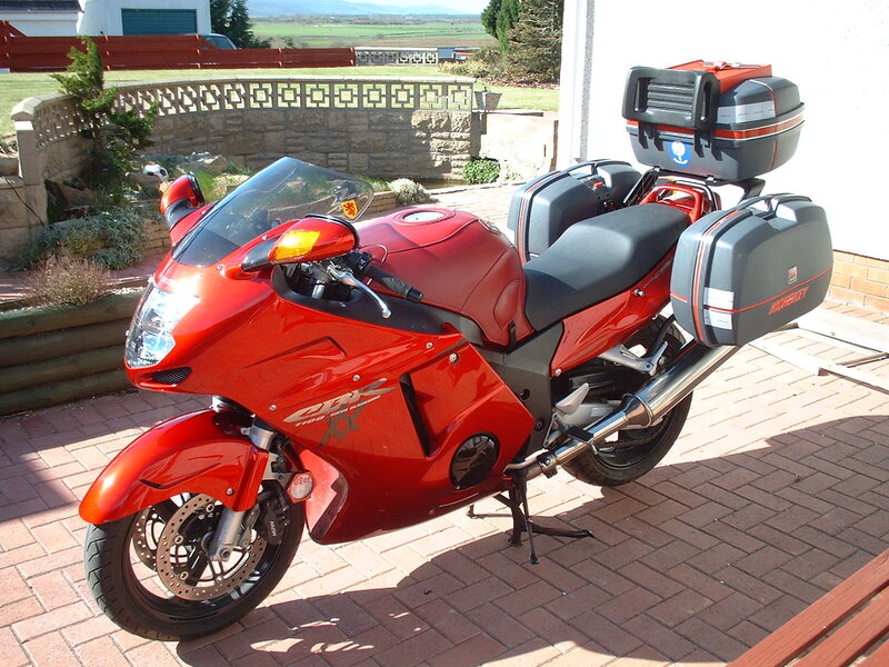 Red sport motorcycle with luggage