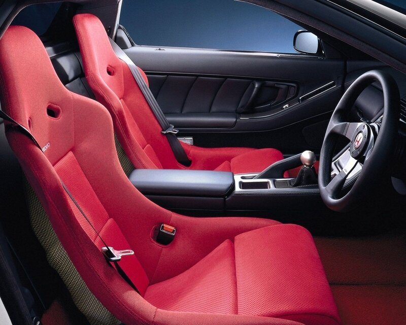 Red sport seats in car interior