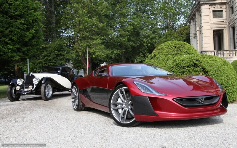 Red sports car and vintage car