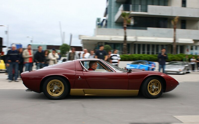 Red sports car at a show