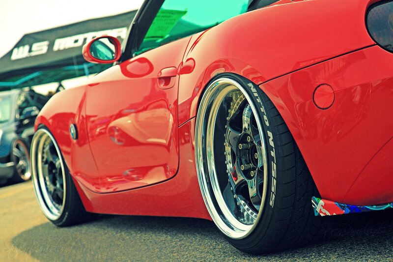 Red sports car at a show