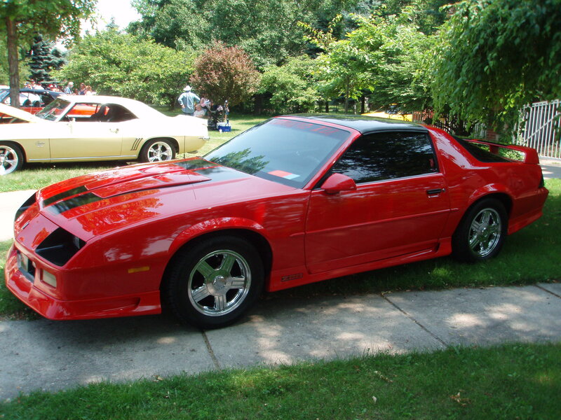 Red sports car at a show
