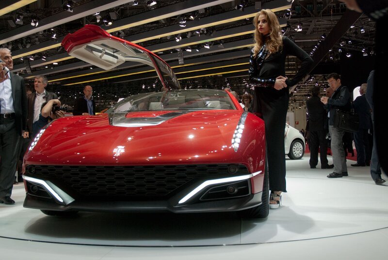 Red sports car at auto show