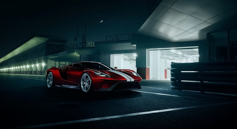 Red sports car at night