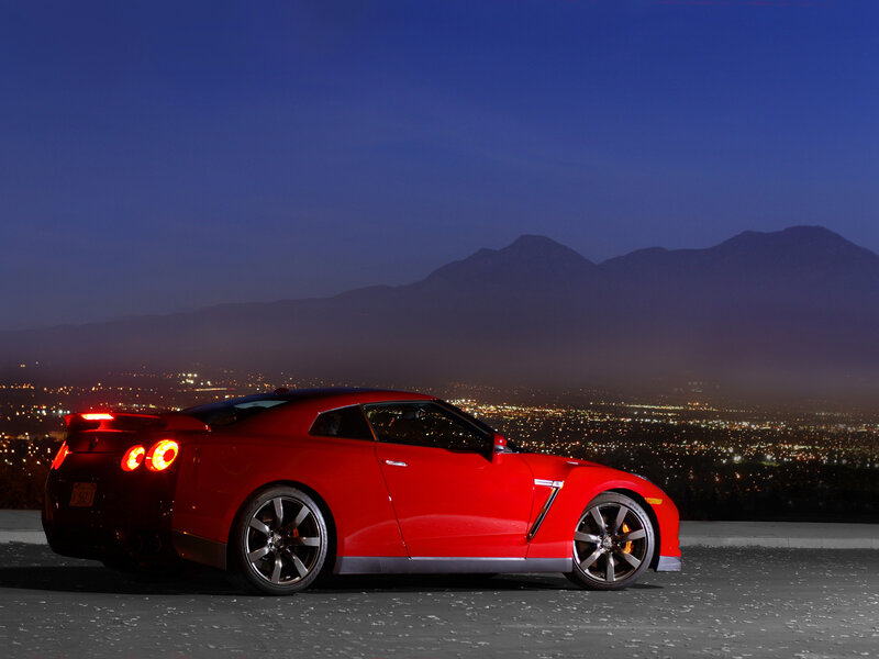 Red sports car at night
