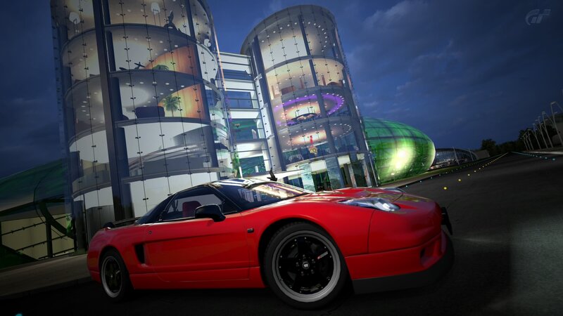 Red sports car at night