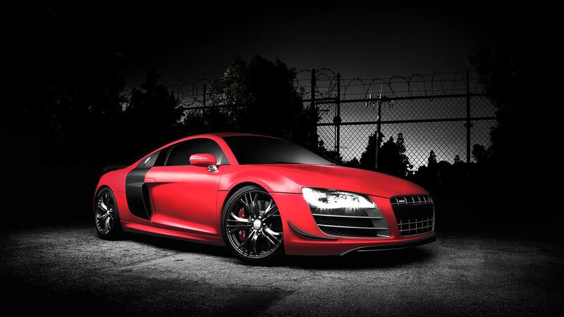 Red sports car at night