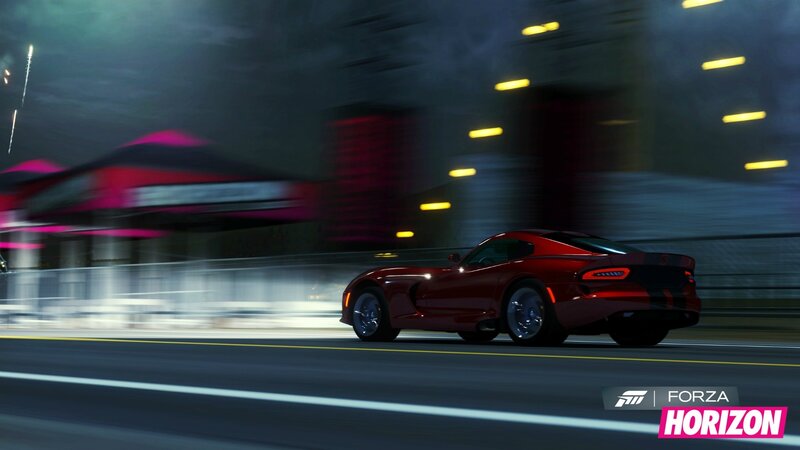 Red sports car at night