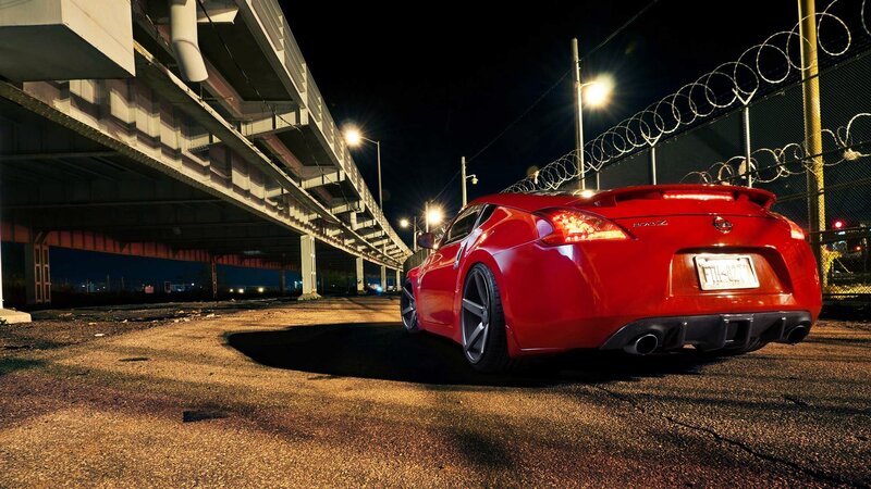Red sports car at night