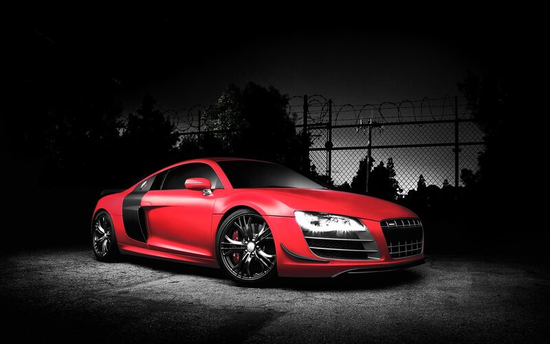 Red sports car at night