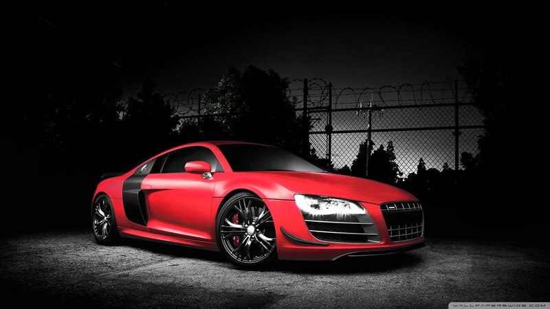 Red sports car at night