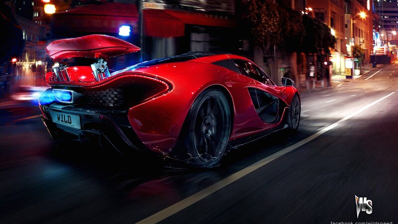 red sports car at night