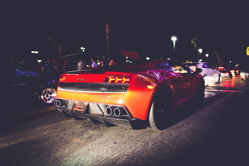 Red sports car at night