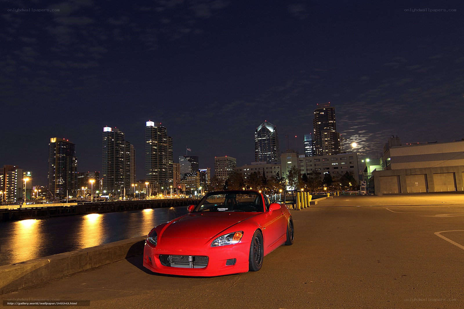 Red sports car at night