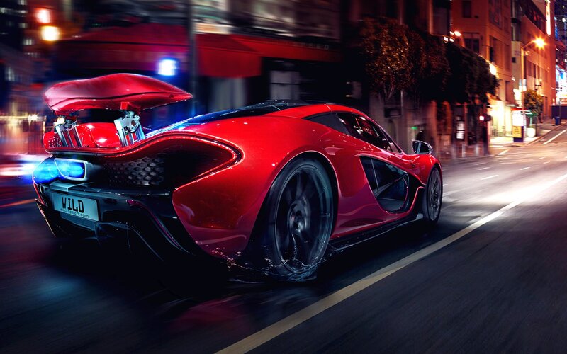 Red sports car at night