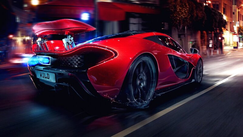 Red sports car at night