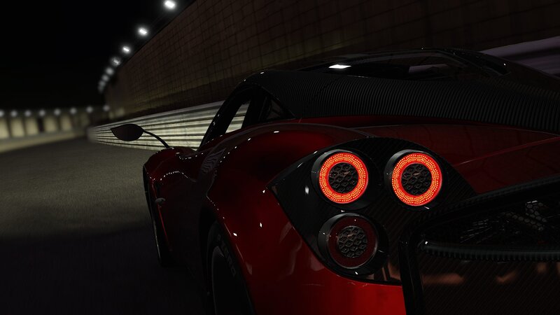 red sports car at night