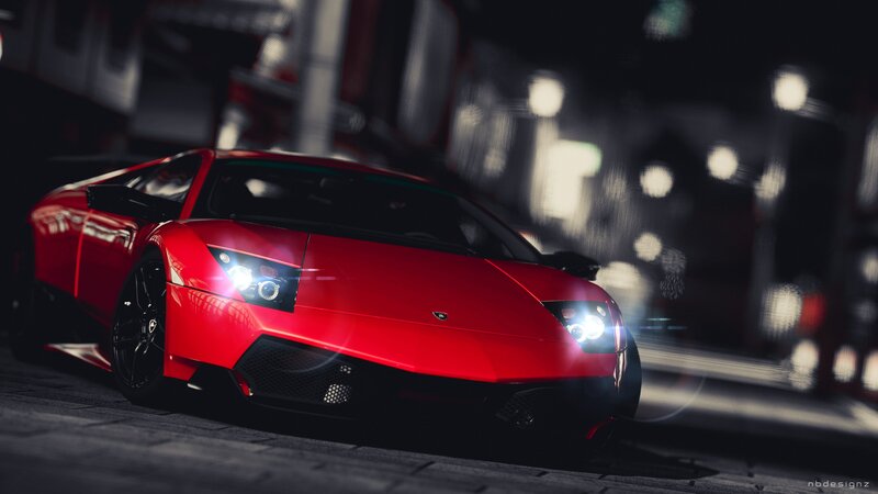 red sports car at night
