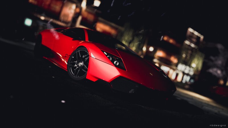 Red sports car at night