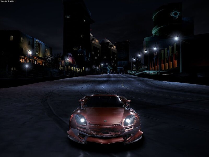 red sports car at night