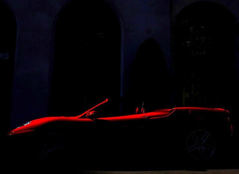 Red sports car at night