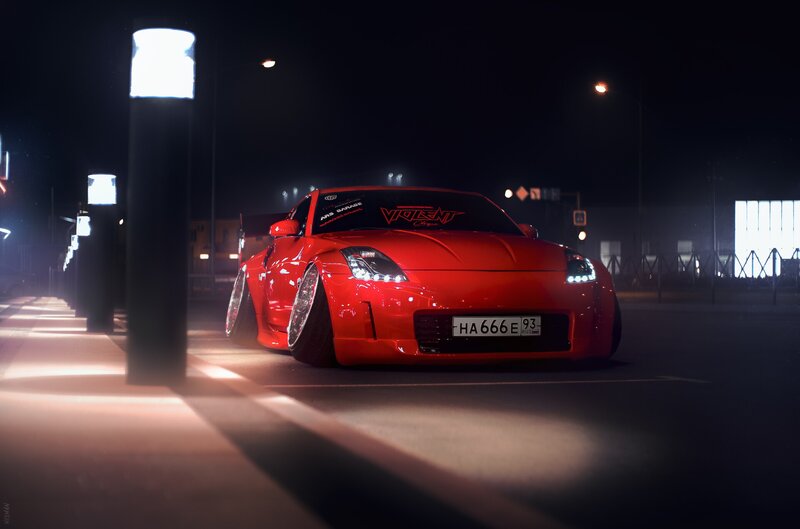 Red Sports Car at Night — Dramatic, Photograph, Streetlights