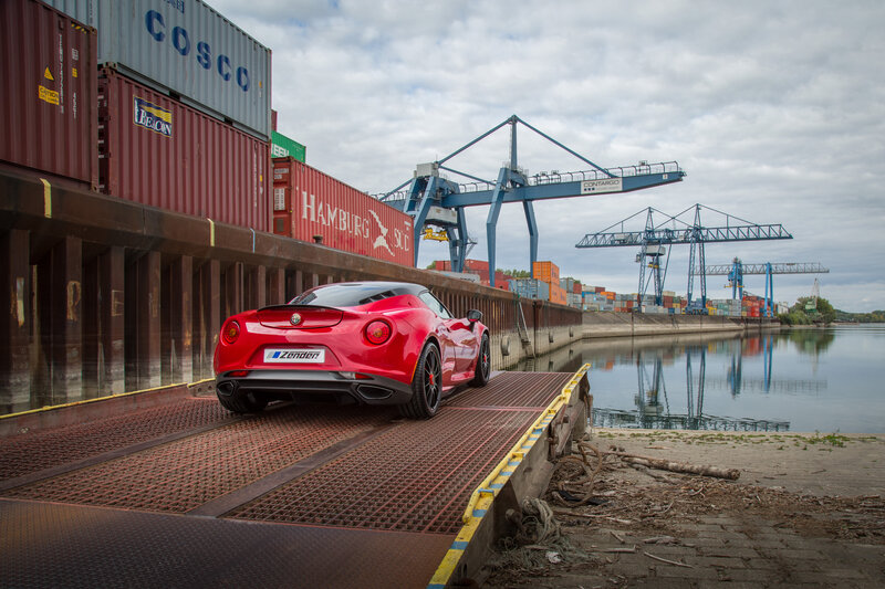 Red sports car at port