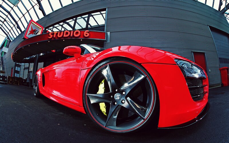 Red sports car at Studio 6