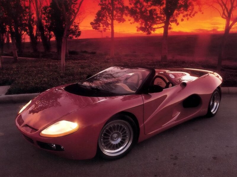 Red sports car at sunset