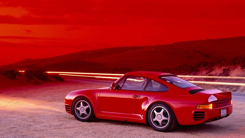 Red sports car at sunset