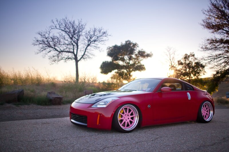 Red sports car at sunset