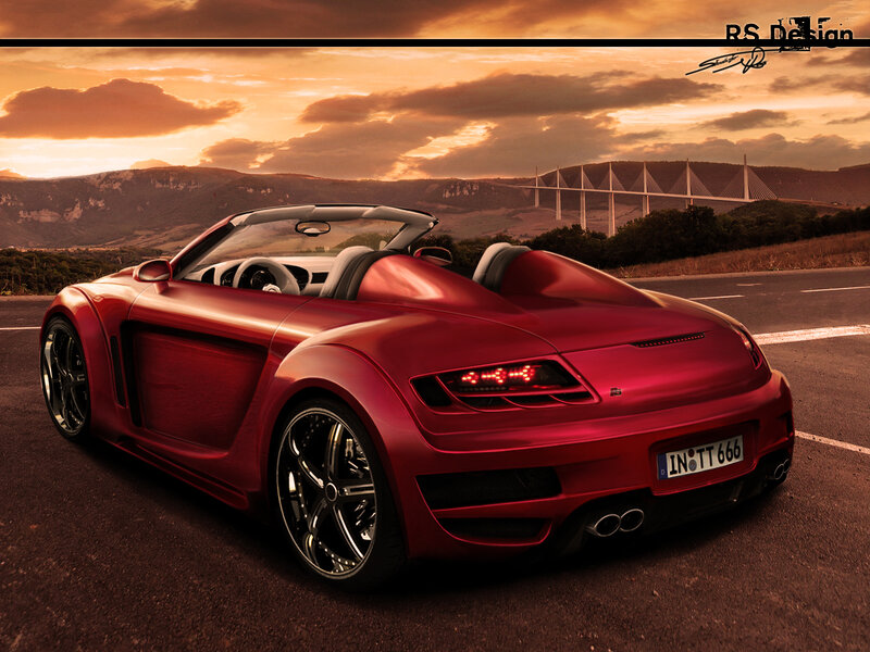 Red sports car at sunset
