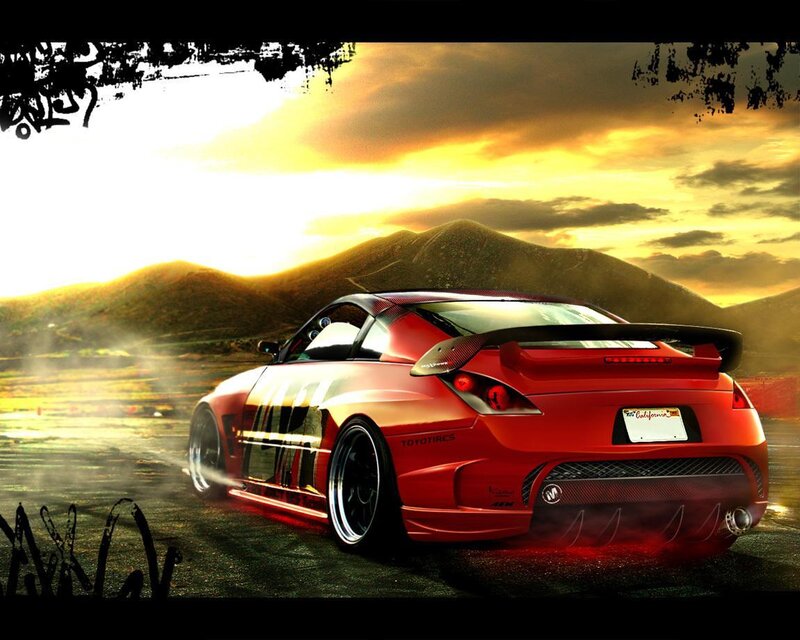 red sports car at sunset