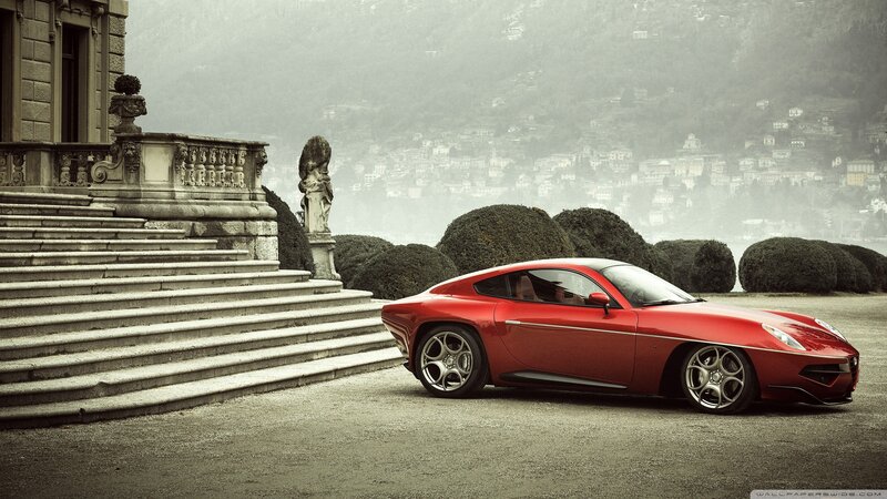 Red sports car at villa