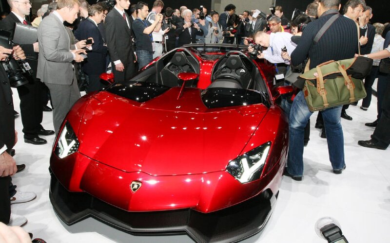 Red Sports Car — Busy, Photograph, People